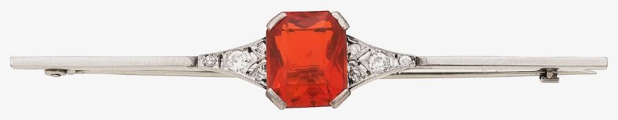 A fire opal and diamond brooch