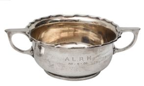 A George V silver twin handled porringer