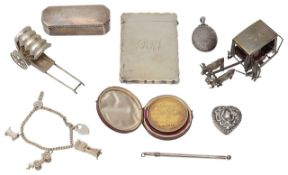 A George V silver card case, silver gilt prize medal + other silver