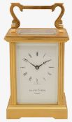 An English gilt brass carriage timepiece retailed by Mappin & Webb