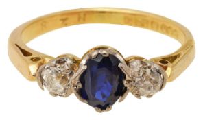 A sapphire and diamond three stone