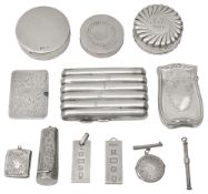 A collection of silver vertu to include an Edwardian stamp double case