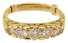An 18ct gold diamond five stone ring