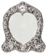 A late Victorian silver mounted heart shaped dressing table mirror