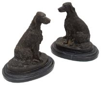 After Barye A pair of anamalier dog bronzes of Irish Setters
