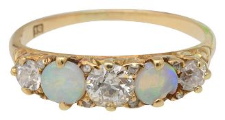 An opal and diamond set ring