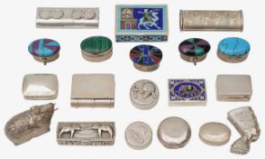 A collection of foreign silver snuff, pill boxes and other item