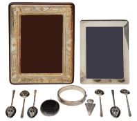 Two silver mounted photograph frames and other silver items