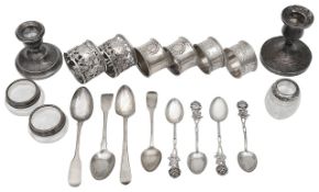 A collection of silver to include pairs of napkin rings