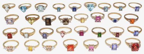 A selection of 9ct gold, colourful gem-set rings