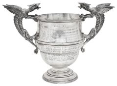 An Edwardian silver twin handled trophy cup