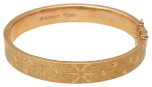 A 9ct gold bangle