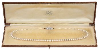 A graduated cultured pearl necklace with diamond-set clasp