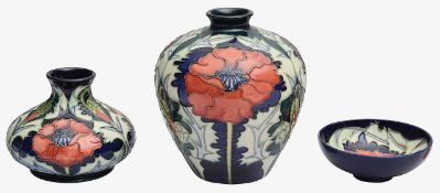 Two modern Moorcroft 'Poppy' pattern vases and small footed bowl (3)