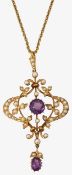 An Edwardian amethyst and seed pearl pendant on chain