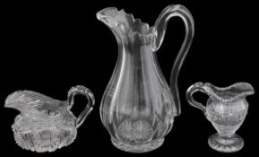 A George III cut glass cream jug and two other jugs