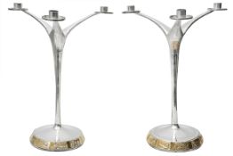 A pair of Elizabeth II three light candelabra 1983