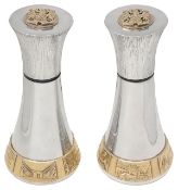A pair of large Elizabeth II Modernist silver and parcel gilt pepper mills