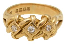 An 18ct gold diamond three-stone knot ring