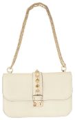 A Valentino Garavani Glam Lock cream shoulder bag