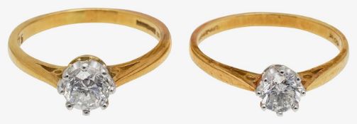 Two diamond single stone rings