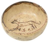 A 19th century continental rustic glazed earthenware bowl