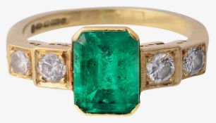 An 18ct emerald and diamond five stone ring