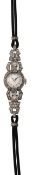 A lady's diamond-set evening wrist watch