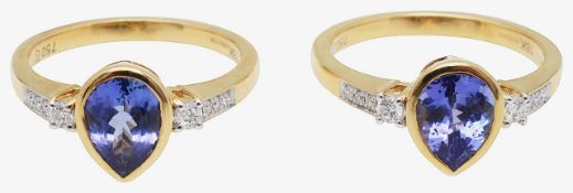 A pair of 18ct gold, tanzanite and diamond set rings