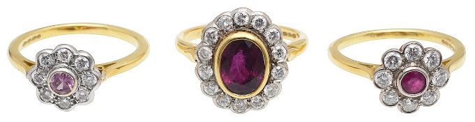 Three 18ct gold, gem-set cluster rings