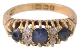 An 18ct gold sapphire and diamond-set graduated ring