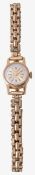 An 18ct gold case lady's wrist watch
