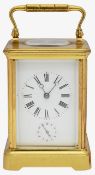 An early 20th century French gilt brass carriage clock with alarm