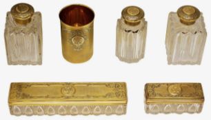 Victorian set of silver-gilt mounted glass toilet bottles, jars and a beaker (6)