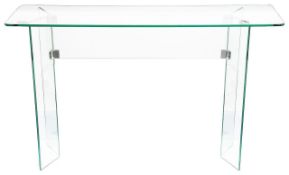 A contemporary glass console table