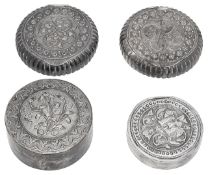 Four Malay silver tobacco and trinket boxes