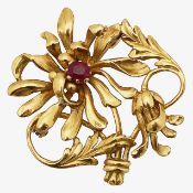 A French Art Nouveau ruby and yellow gold brooch