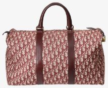A Christian Dior red holdall