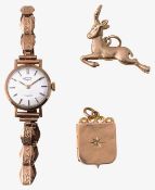 A late Victorian 15ct gold locket ad other items