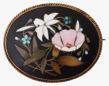 A 19th century pietra dura floral brooch