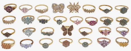 A collection of 9ct gold, colourful gem-set cluster rings