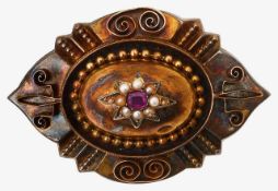 A Victorian ruby and half pearl Etruscan brooch