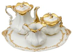 A KPM porcelain three piece tea service and a Meissen tray