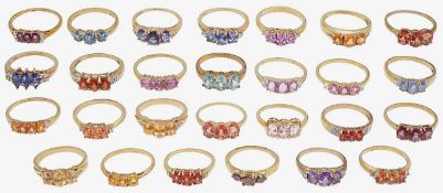 A collection of 9ct gold, colourful gem set rings