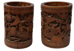 A pair of Chinese carved bamboo brush pots