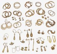 A collection of earrings and ear-studs