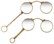 A pair of Continental spring loaded lorgnettes