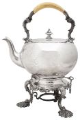 A Victorian silver tea kettle on and associated stand