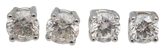Two pair of diamond ear-studs