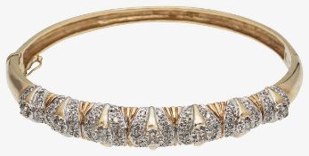 A diamond set hinged bangle